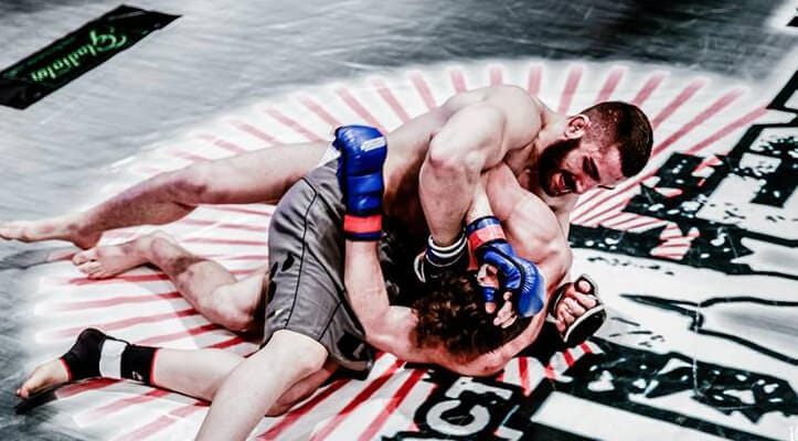 Andreas Tricomitis working from dominant top position against his opponent at Full Contact Contender