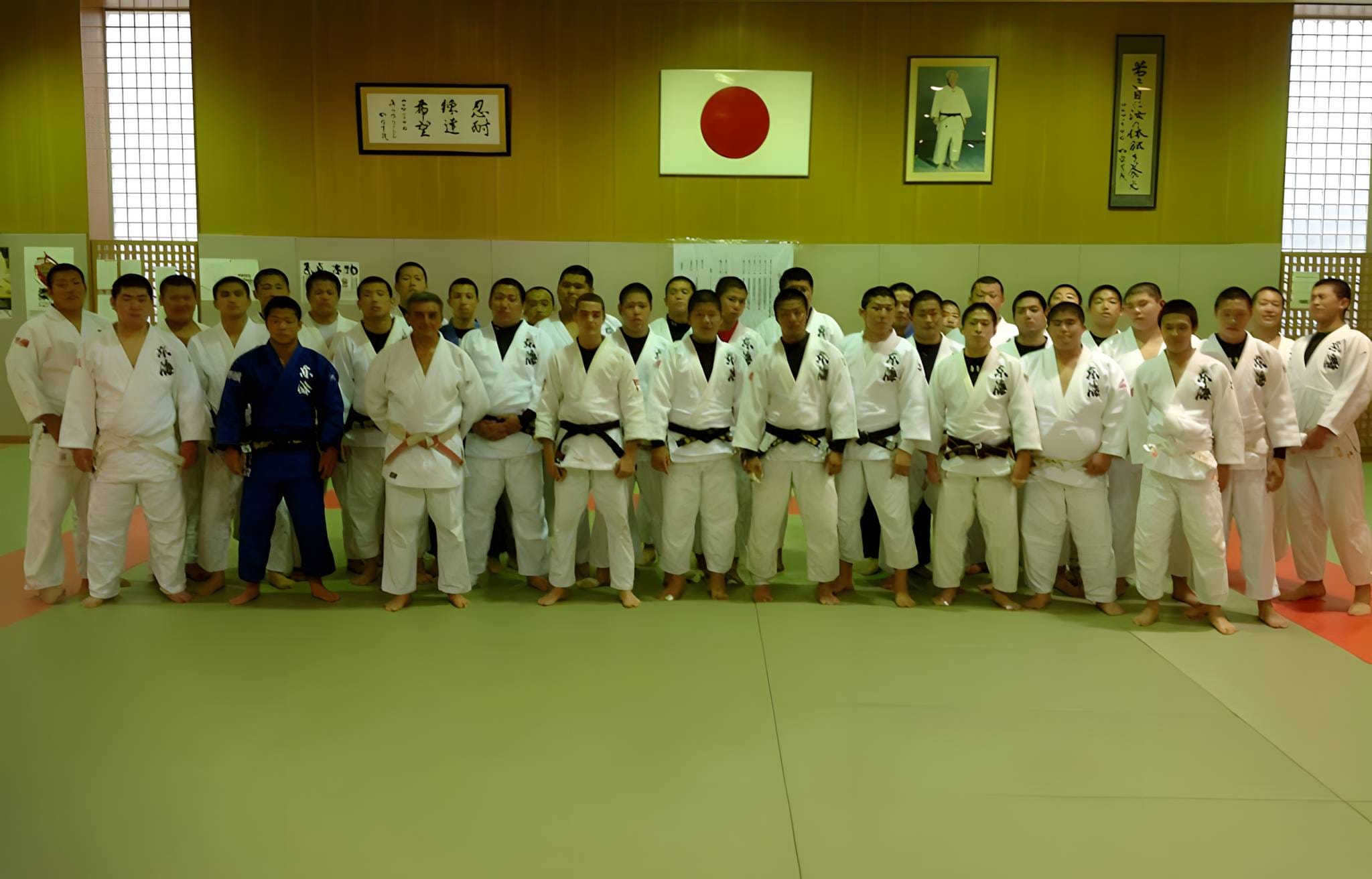 Andreas Tricomitis with the judo squad at a training hall in Japan