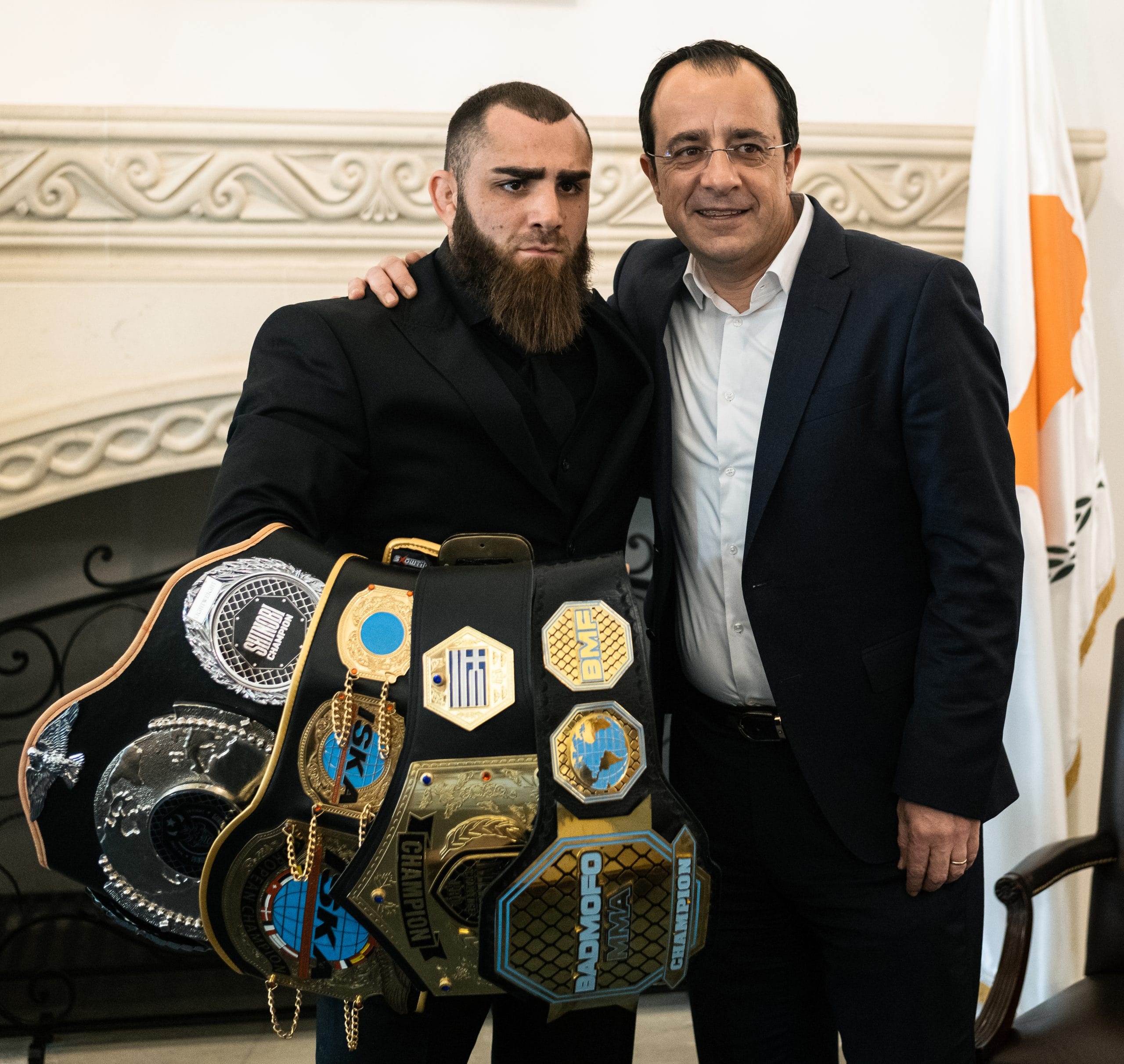 Andreas Tricomitis MMA Champion with the President